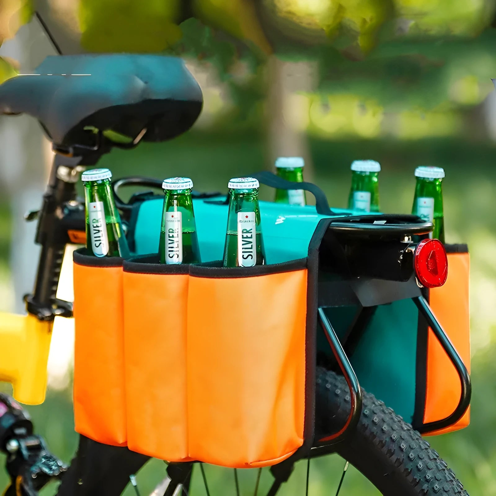Black bicycle drink bottle cage storage bag mounted on bike frame showing 600D PVC construction and 2-litre capacity