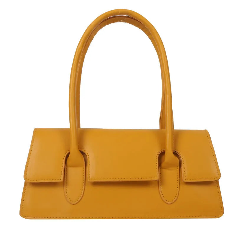 Women's retro style small square shoulder bag in four colours with adjustable strap and stitching detail