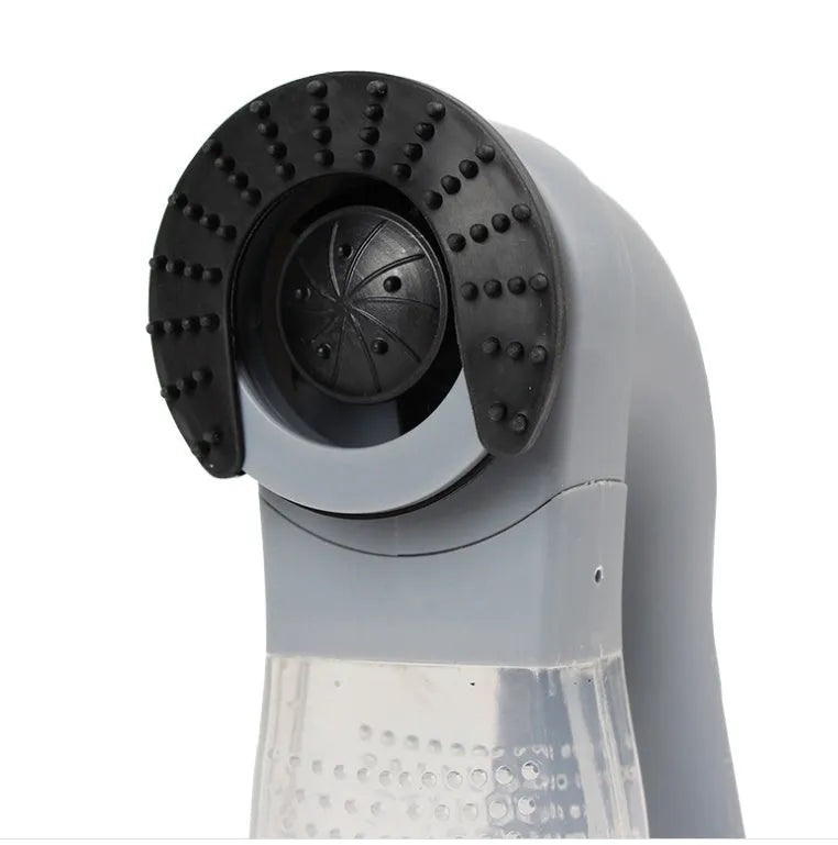 Grey portable electric pet hair vacuum cleaner with soft rubber head for dogs and cats.