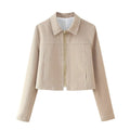 Women's beige herringbone pattern jacket and trousers suit set with 3D embroidery detail.