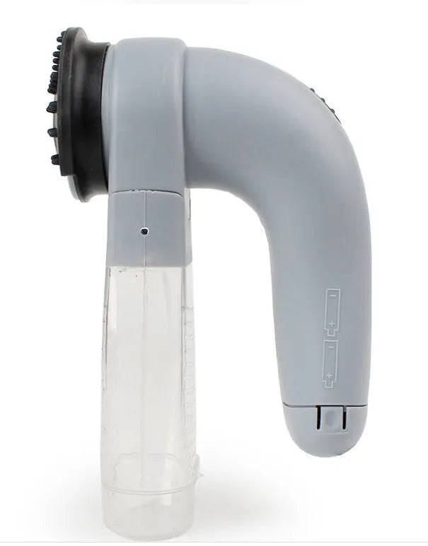 Grey portable electric pet hair vacuum cleaner with soft rubber head for dogs and cats.