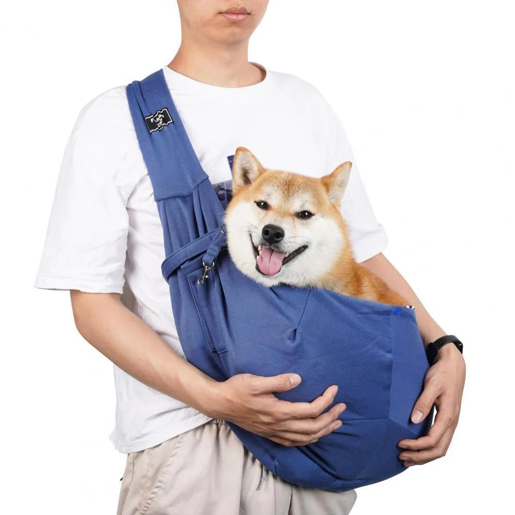 Large breathable mesh cat carrier backpack shown in a folded position and worn on a person's back.