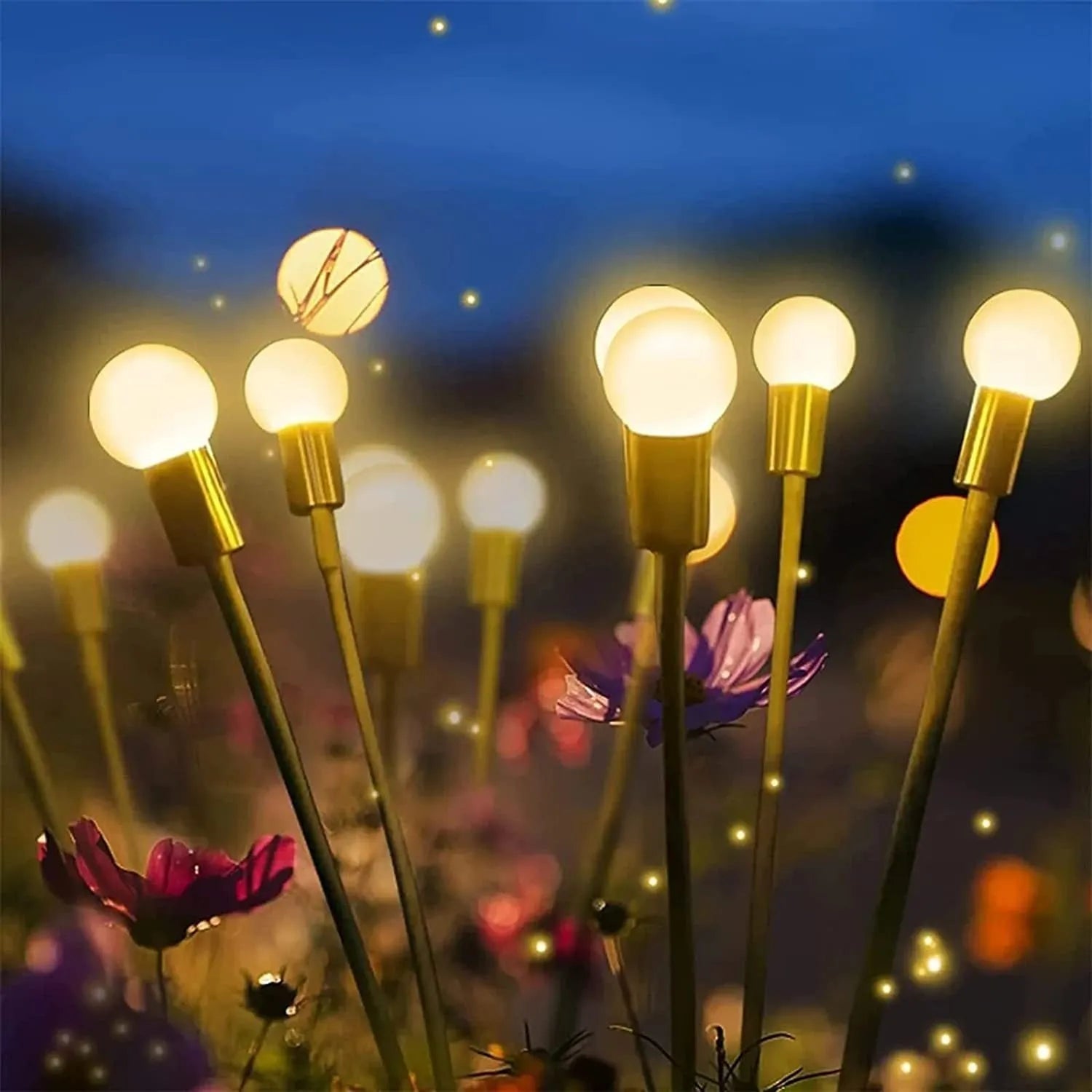 Solar-powered LED garden ground light with multiple heads and a stainless steel stake inserted into soil.