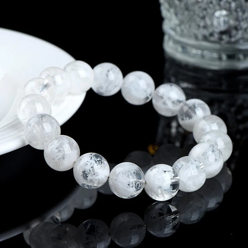 Crystal women's bracelet with natural blizzard snowflake round beads in geometric design featuring Ruyi and Xiangyun elements