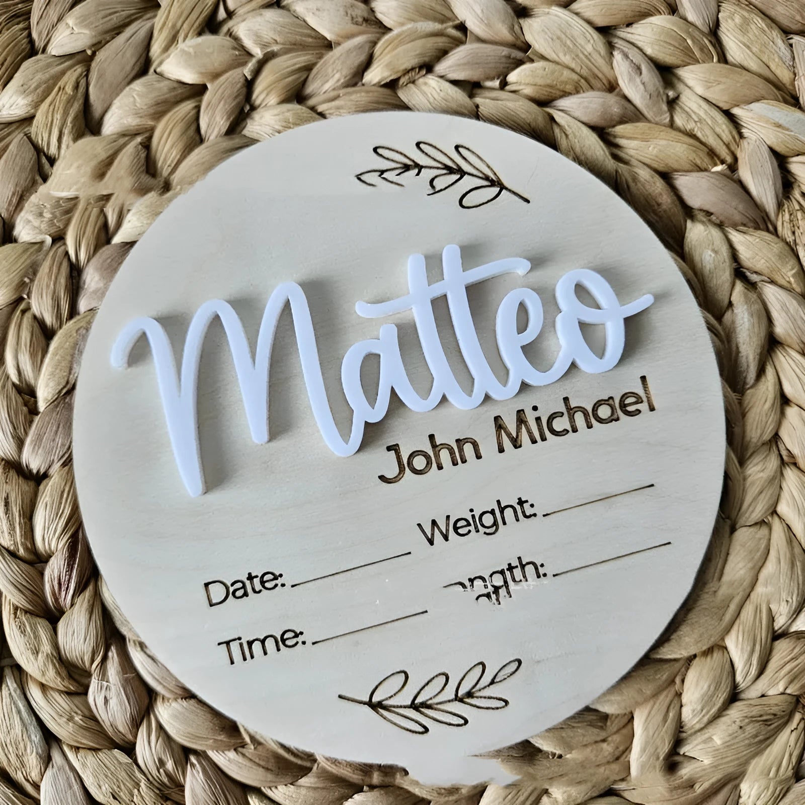 Square wooden baby name sign with birth information, 15 cm wide, in one of three style variants.