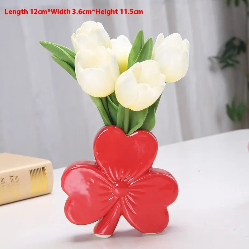 Clover-shaped white porcelain ceramic vase in light green, pink, red, or white colour.