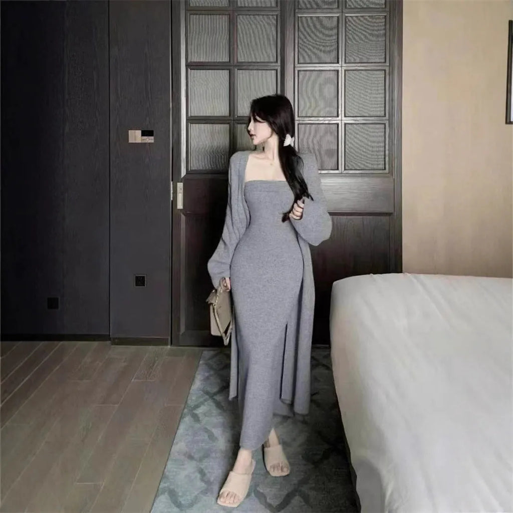 Women's gray knitted cardigan dress suit set with long skirt and regular sleeves.