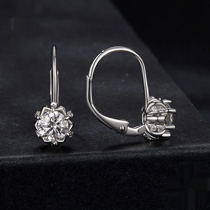Sterling silver flower bud ear clips with moissanite centre stones and white gold plating