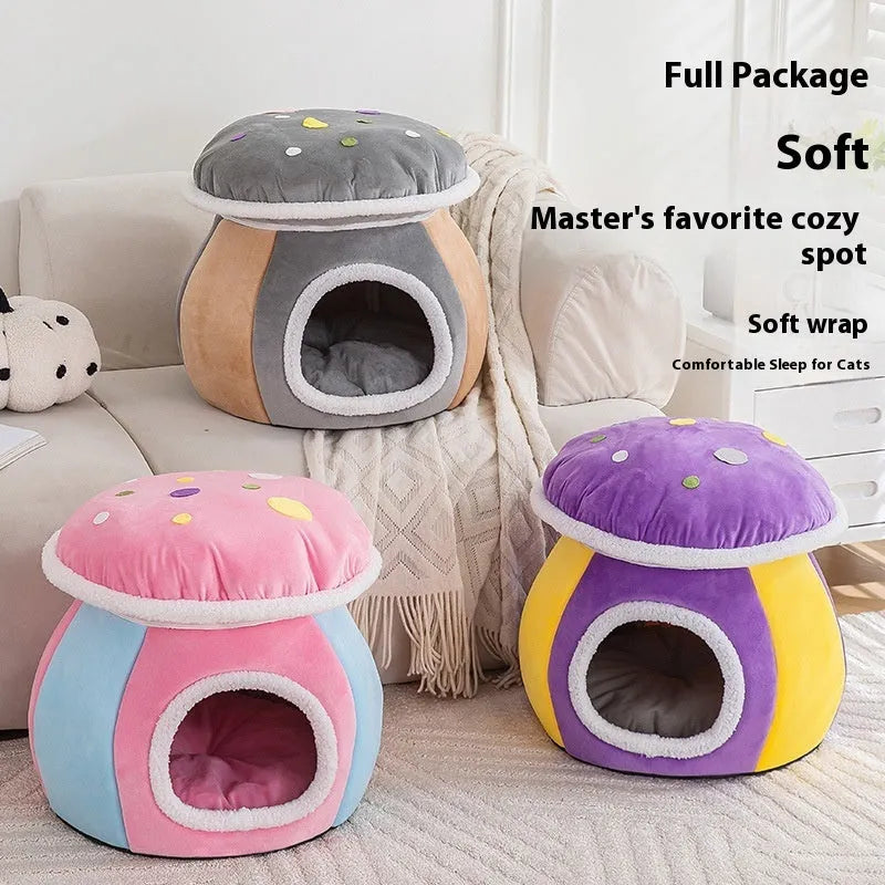 Grey mushroom-shaped plush cat bed with a detachable blanket, shown on a wooden floor.