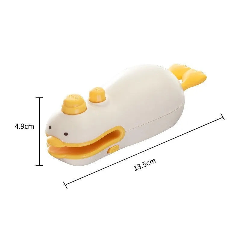 Yellow duck jacquard patterned rechargeable handheld bag sealing machine with USB charging cable.