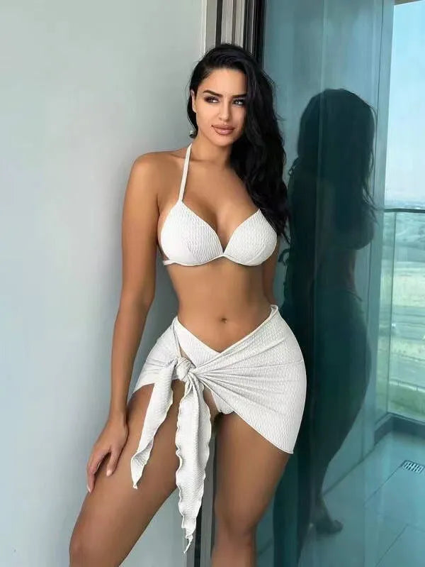 Women's sexy black three-piece swimsuit with a Russian split design on the briefs and a matching skirt