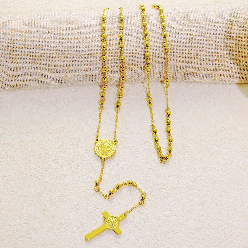 Stainless steel cross pendant necklace in golden colour with a priest pendant design on a simple chain