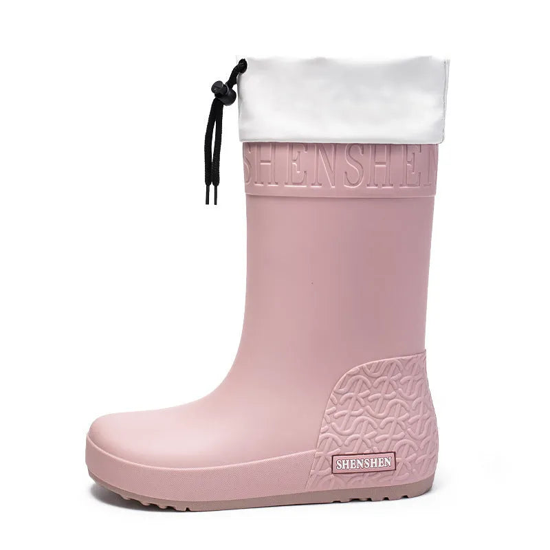 Women's PVC rain boots with non-slip soles in apricot, black, brown, and pink colour options