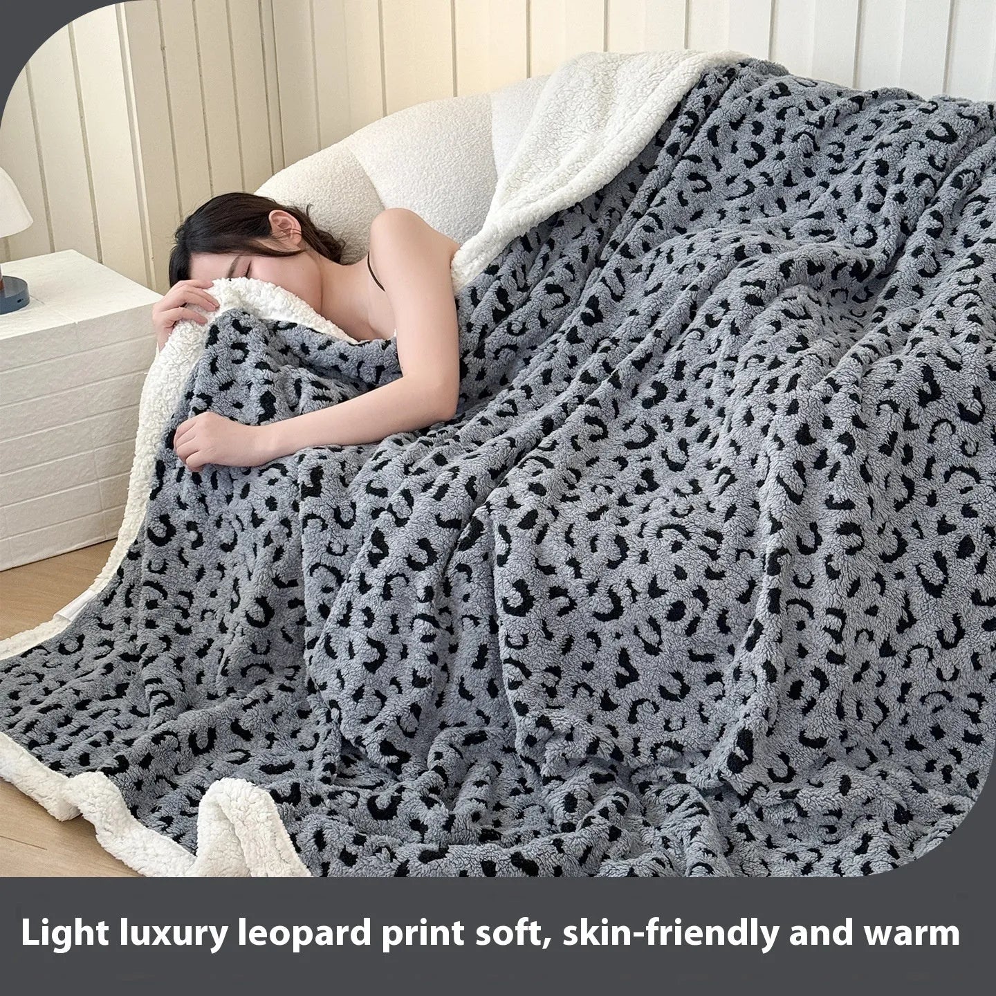 Double-layer cationic leopard jacquard taffeta blanket showing animal print pattern detail