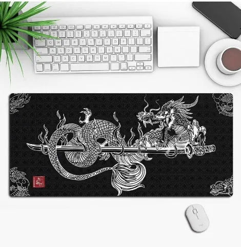 Large custom anime print gaming mouse pad on a desk with keyboard and mouse.