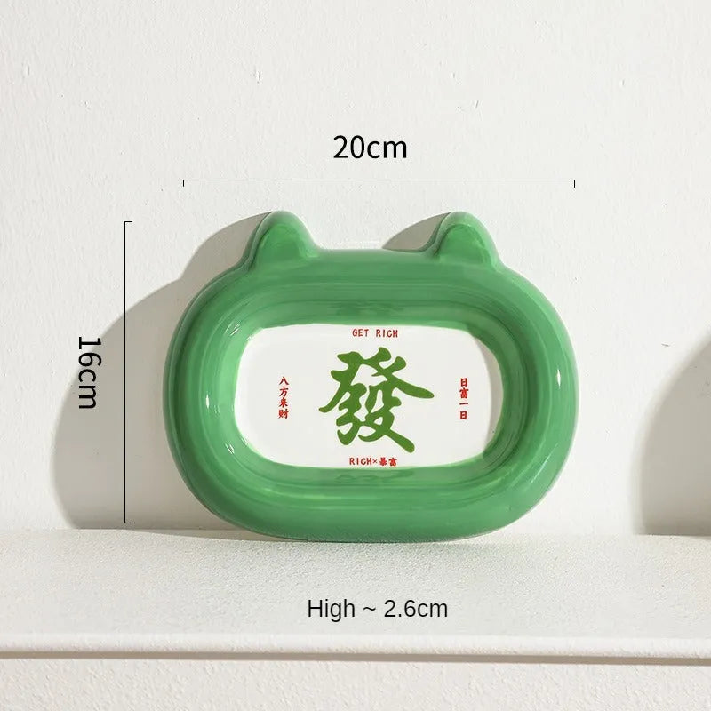 Ceramic pet bowl with hand-painted gold wealth motif and animal design for cat or dog feeding