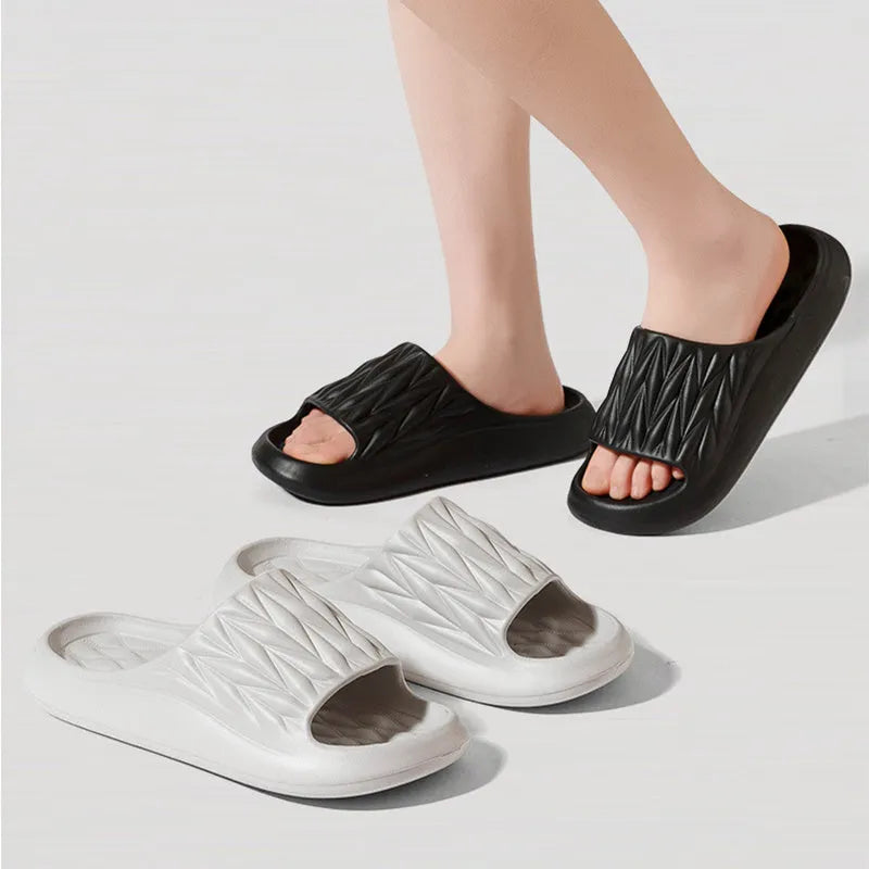 Leaf texture design EVA slippers in various colours showing non-slip sole detail