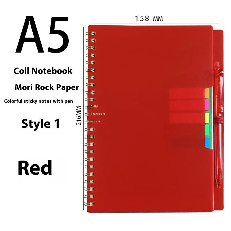 Erasable coil notebook with customisable cover options on waterproof rock stone paper, shown with pen.