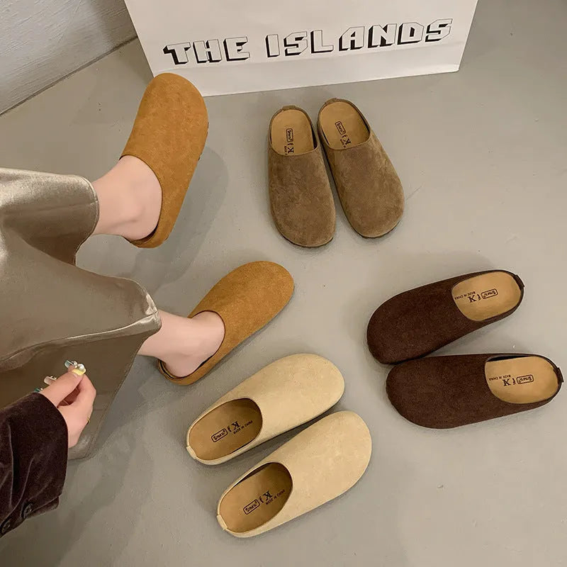 Flat outdoor slip-on slippers with square toe in apricot colour on a plain background.