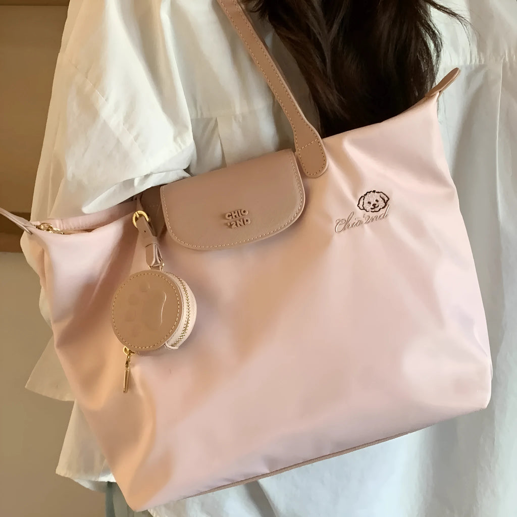 Large capacity Oxford cloth tote shoulder bag in pink with sandwich pocket and mobile phone pocket design