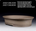Handmade antique oval purple sand bonsai pot with dimensions 25x21x6.3 cm.