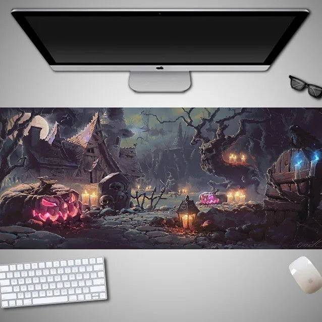 Oversized Halloween-themed gaming mouse pad with non-slip base on a desk.