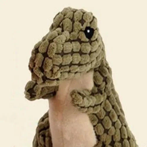 Grey, green, and orange durable dog toys with sound for chewing and boredom relief.