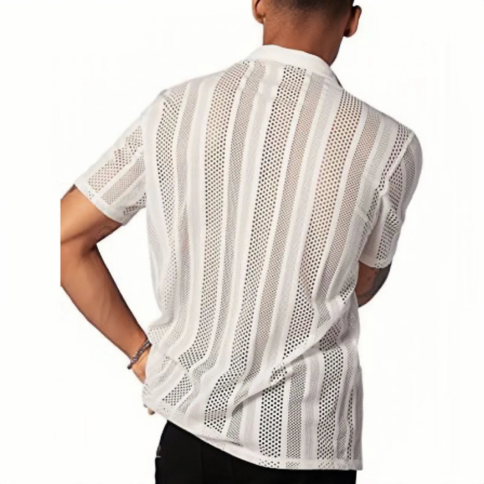 Man modelling a black short-sleeved knitted button shirt with jacquard texture