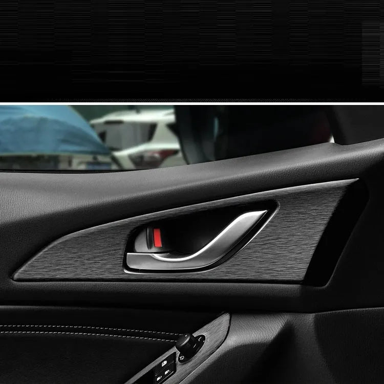 Car interior decorative film sticker kit showing carbon fibre pattern applied to centre console and dashboard