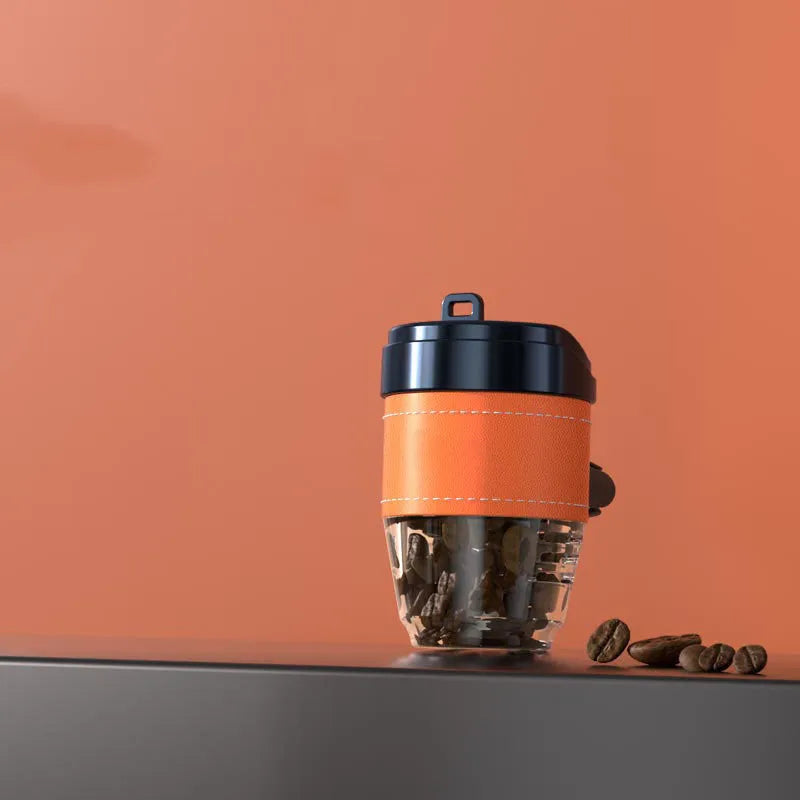 Solid plastic car air freshener shaped like a coffee cup in various colours.