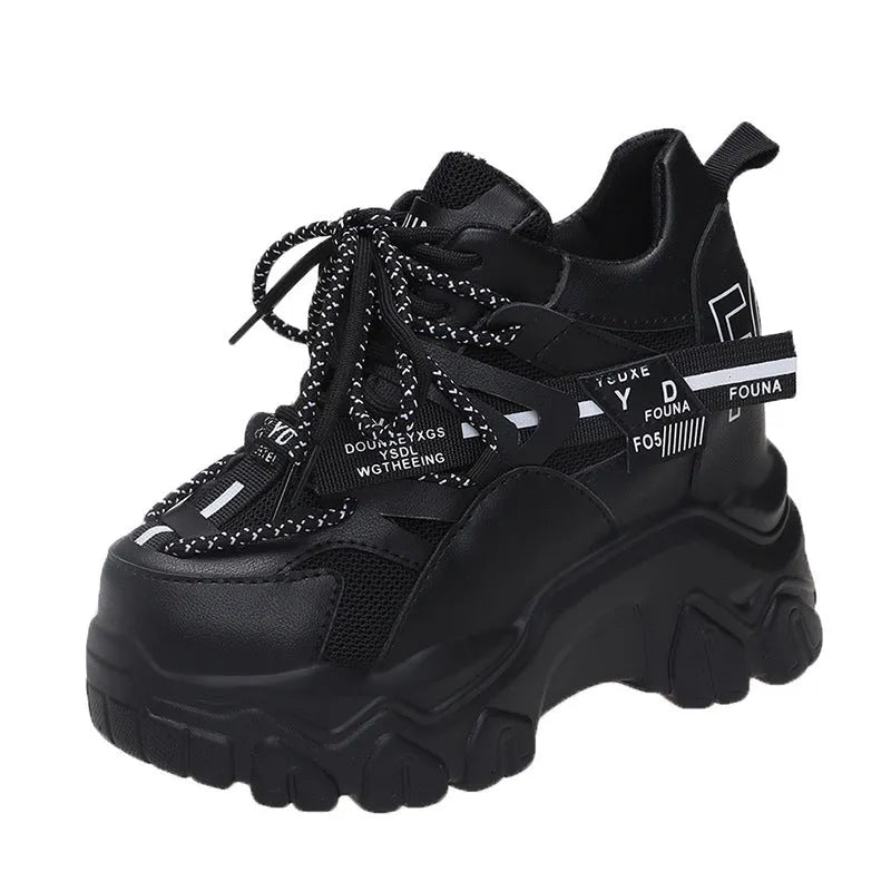 Women's white and black mesh platform sports shoes with cross-strap design and rubber sole
