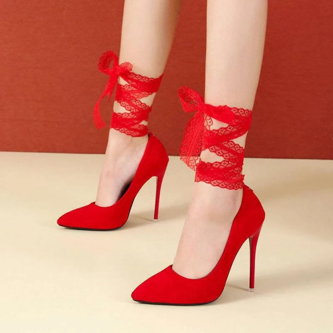 Black pointed toe high heel with lace ankle strap on a 12cm heel.