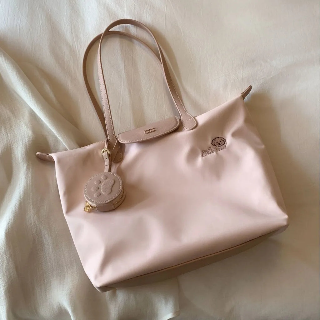 Large capacity Oxford cloth tote shoulder bag in pink with sandwich pocket and mobile phone pocket design