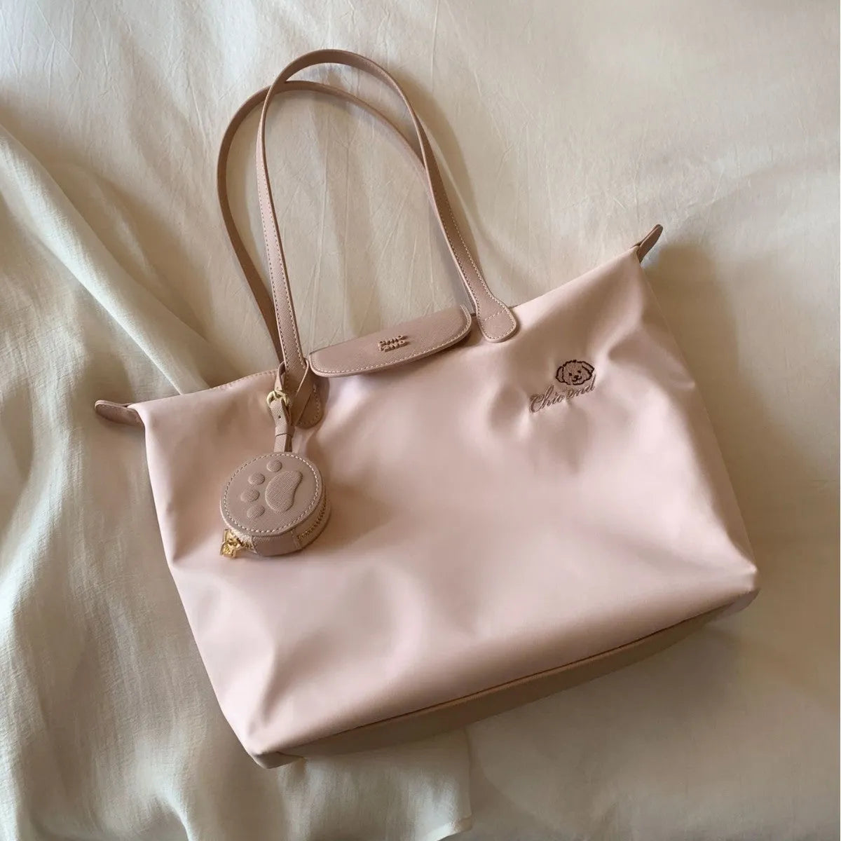 Large capacity Oxford cloth tote shoulder bag in pink with sandwich pocket and mobile phone pocket design