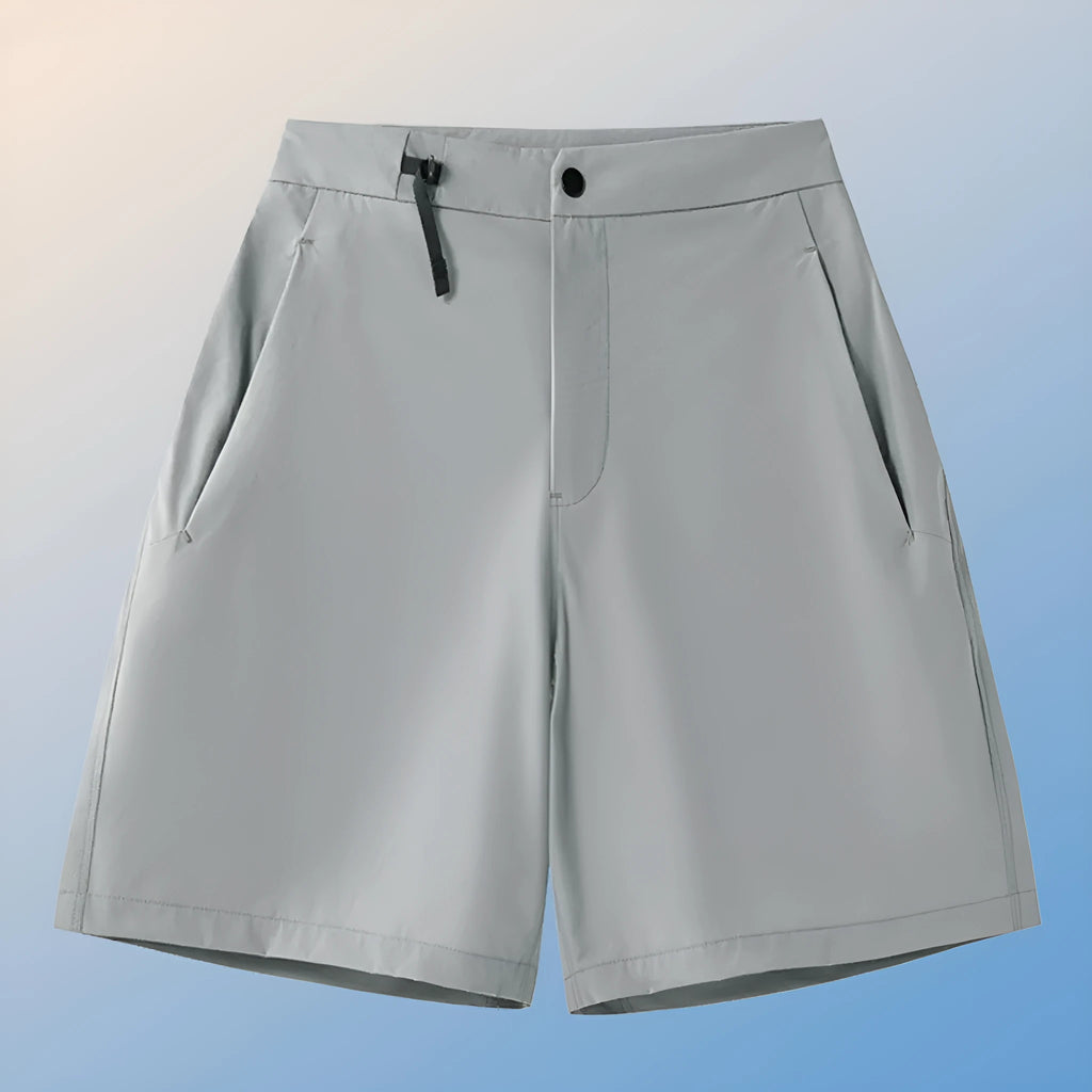 Men's solid colour quick-drying sports shorts with elastic waist on a neutral background.