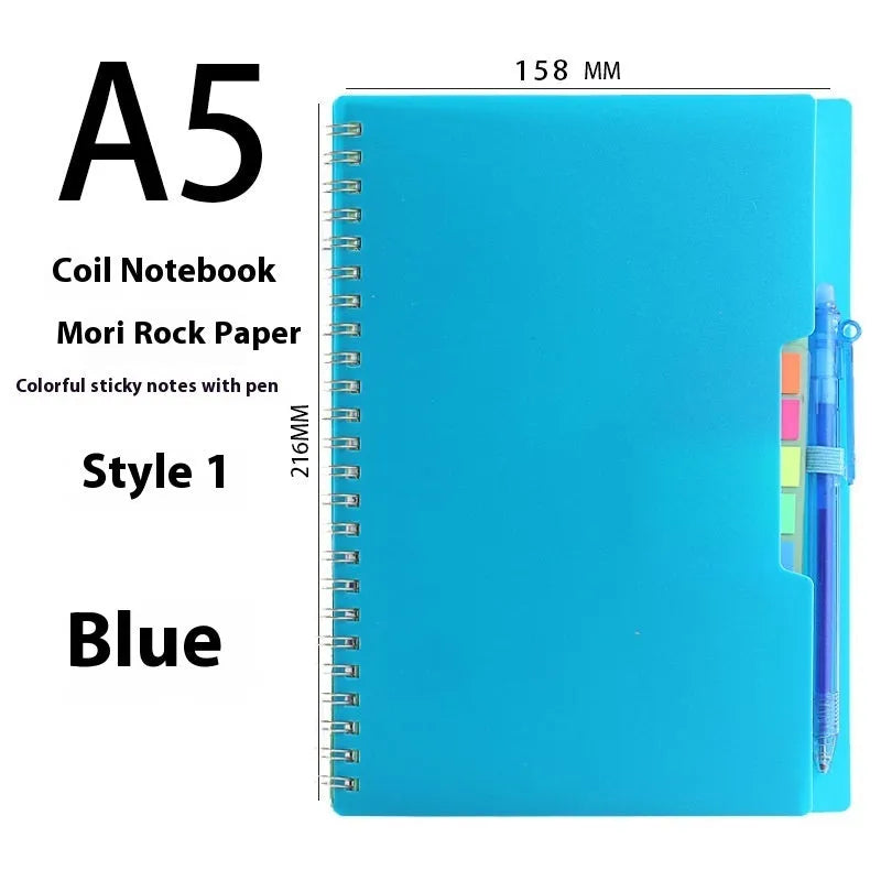 Erasable coil notebook with customisable cover options on waterproof rock stone paper, shown with pen.