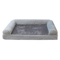 Square cloth dog bed with raised edges in blue colour showing sponge construction