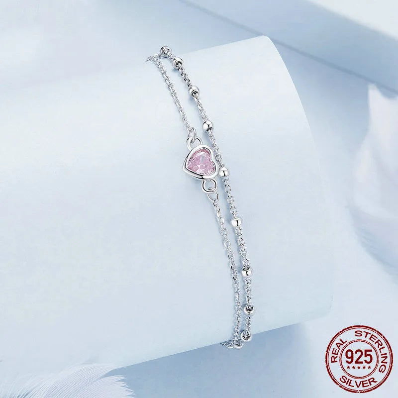 Sweet girlish style 925 sterling silver bracelet with a small heart pendant on an adjustable chain.