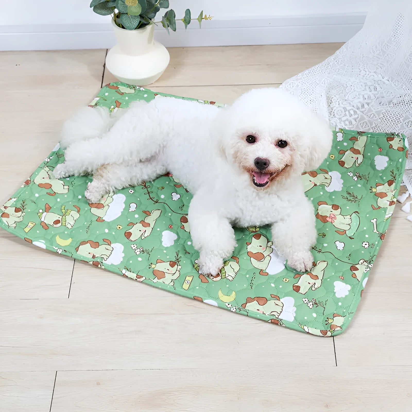 Reusable waterproof pet training pad in animal print design on a wooden floor.