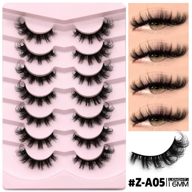 Box of artificial fibre false eyelashes in six styles with a tube of adhesive glue.