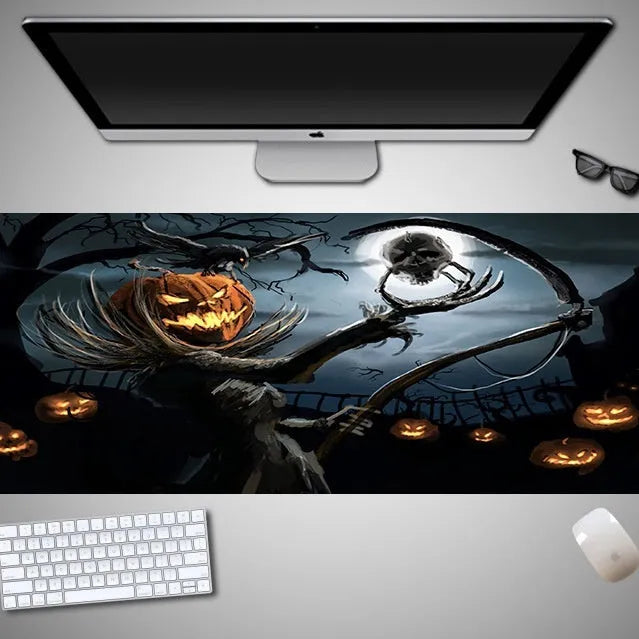 Oversized Halloween-themed gaming mouse pad with non-slip base on a desk.