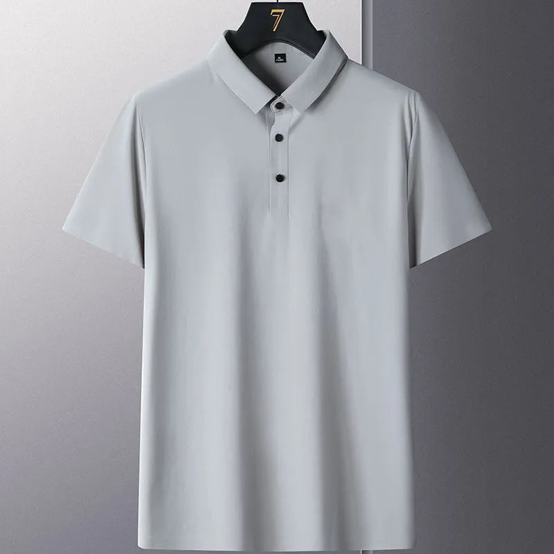 Man wearing a solid colour non-ironing short sleeve casual top in a navy blue shade.