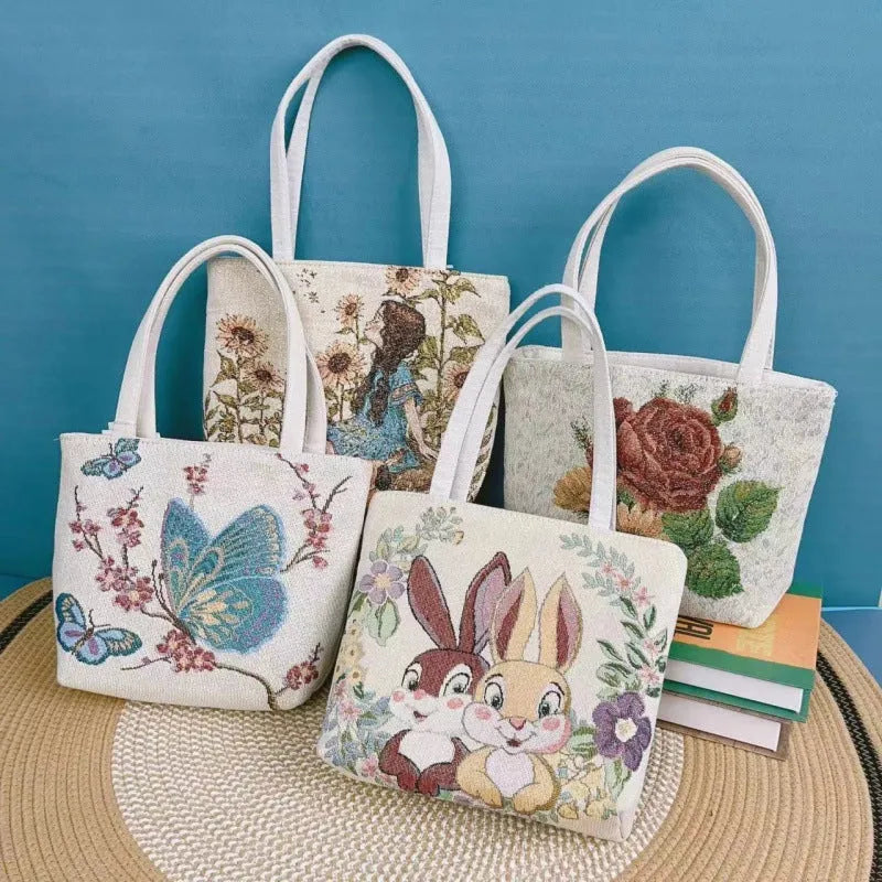 Double-sided gold wire embroidered canvas bag in small, medium, or large size.