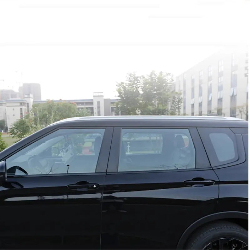 Pre-cut protective films for 23 Outlander window pillars in carbon fibre and bright black finishes.