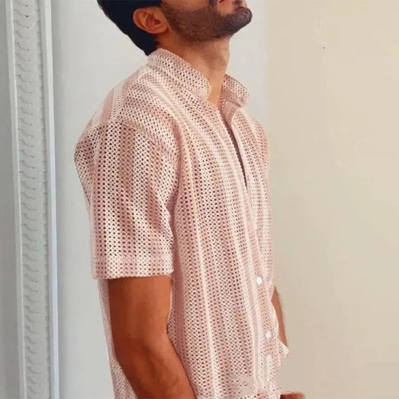 Pink men's loose fit short sleeve cardigan with waffle hole texture on a hanger