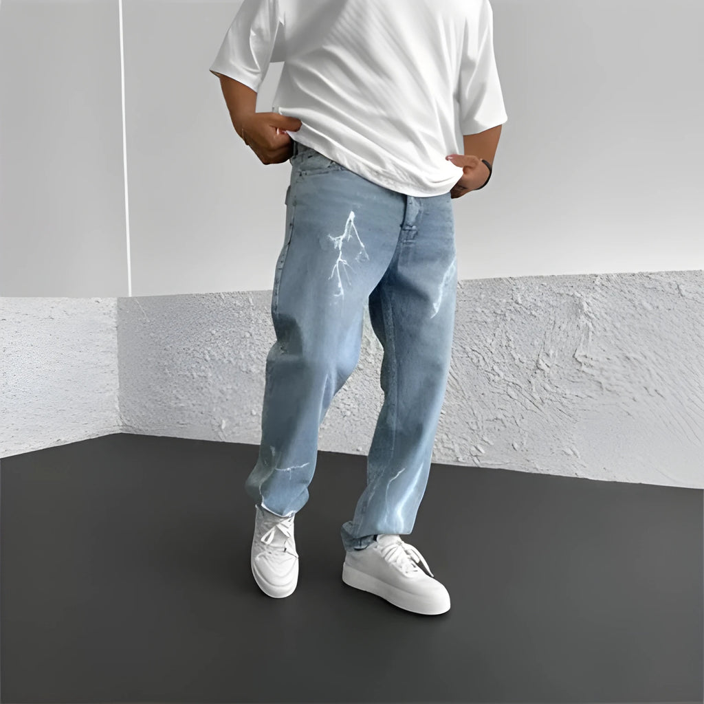 Men's blue straight-leg denim trousers with mid waist and zipper fly on neutral background
