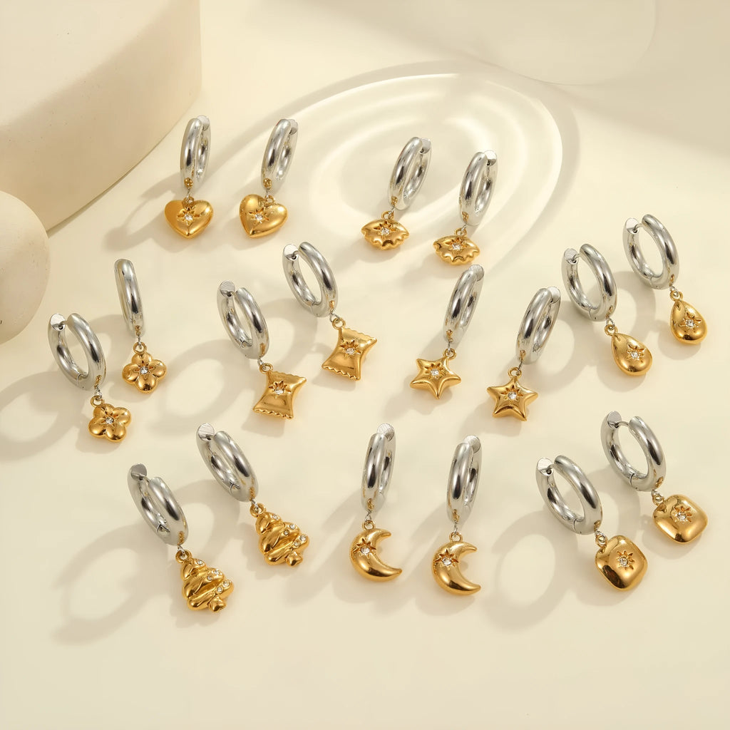 Christmas tree shaped stainless steel earrings with 18K gold electroplated finish and heart star geometric accents