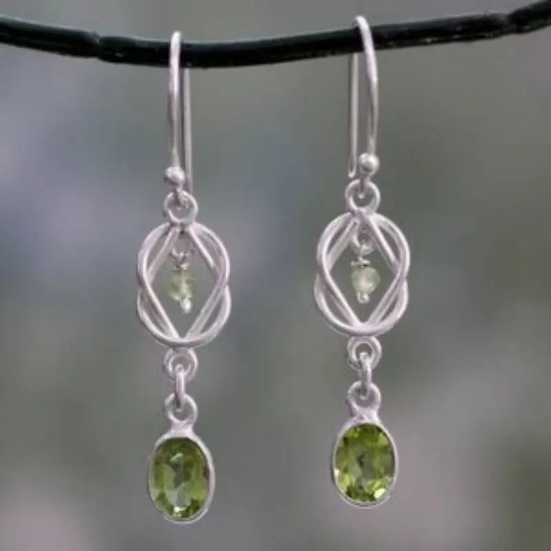 Silver alloy women's earrings with green gem micro inlay, geometric ellipse and line design, Maillard style