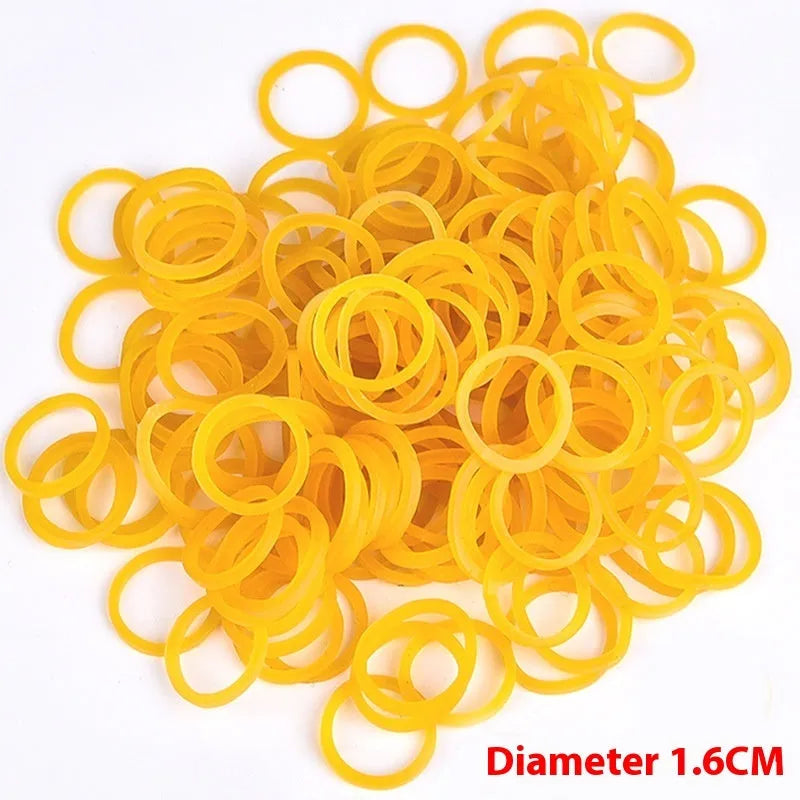 500g pack of yellow industrial rubber bands in multiple diameters from 16mm to 70mm for heavy duty bundling