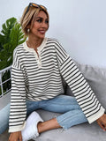 Black women's striped long sleeve top with drop-shoulder sleeves and contrast colour details
